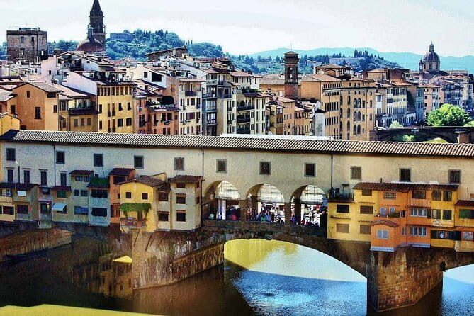 Florence Walking Tour with Accademia, Uffizi & Lunch - Ponte Vecchio finish: the jewelry bridge moment